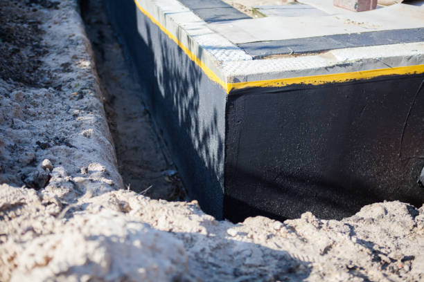 Professional Emergency Waterproofing technician working in Iron Ridge, WI